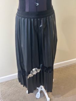 NWT Gracia Black Pleated Maxi Skirt with Lace Panel Size M  Sleek pleated faux leather maxi silhouette in glossy black. Lace inset detail near hem add