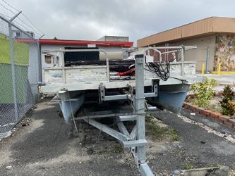 Pontoon Boat And Trailer
