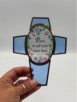 Stained glass cross suncatcher featuring a floral design