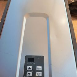 RINNAI R94 LS NON CONDENSING TANKLESS WATER HEATER.