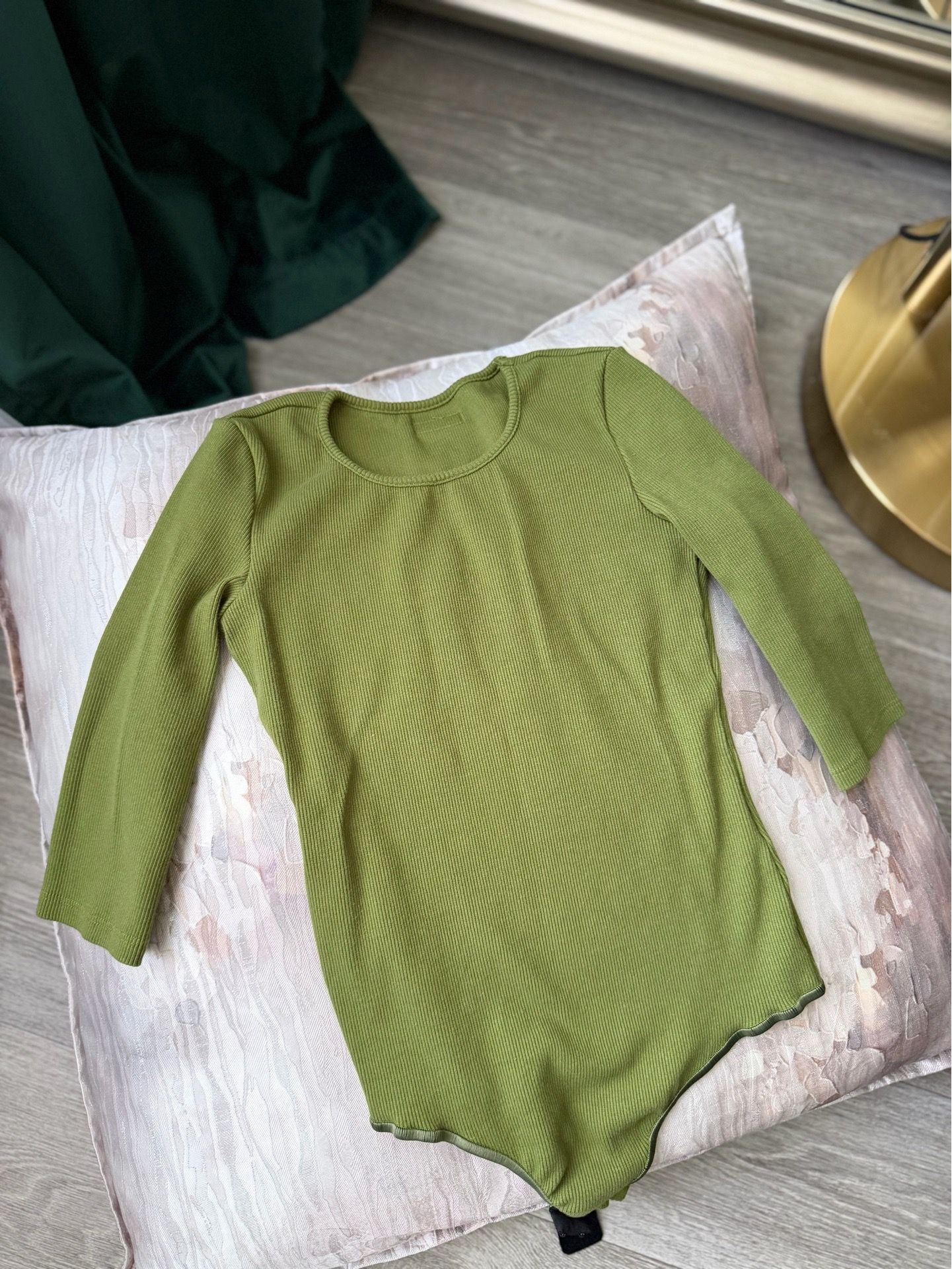 Pistachio-colored bodysuit