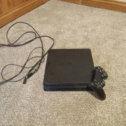 PS4 with Controllers And Adapters