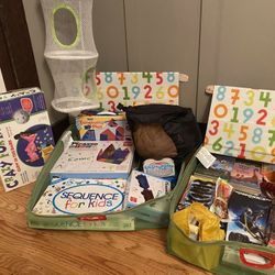 Kids games, crazy fort, parachute, books, 2 storage bins, hanging storage etc...