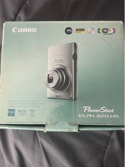 Pink  Canon powershot ELPH 320 digital camera
