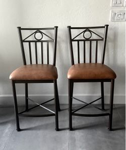 Two counter bar stools