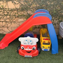 Toys: Slide, Ride On Car And A Bus
