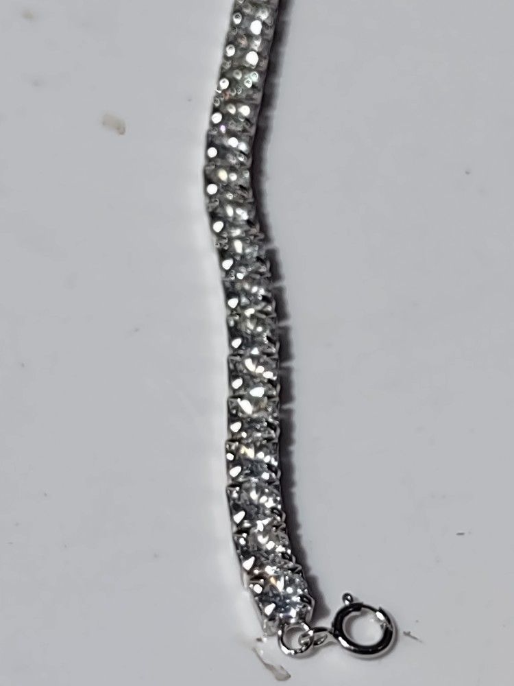 sterling silver tennis bracelet. The bracelet has sparkling White CZ diamonds.