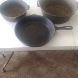 vintage cast iron pots and pan