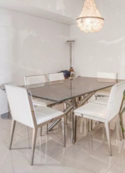 Dinning table with 6 leather chairs (Like New)