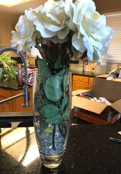 Vase heavy with flowers