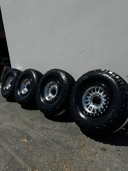 FINANCING AVAILABLE KMC KM552 IMS 6x5.5 17" Wheels With 35” BFGoodrich K02 All-Terrain Tires Machined with Black Lips