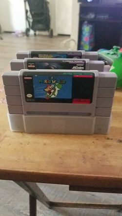 Super Nintendo games ( super mario world, spiderman x men arcade revenge and mortal kombat 2