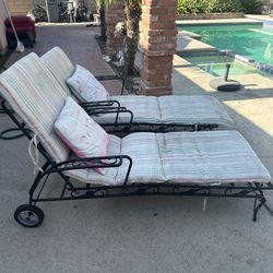 Two Wrought Iron Pool Chairs with back Wheels