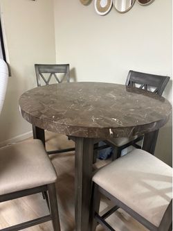 Solid Round Table with four Chairs!