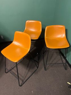 Brown barstool chairs