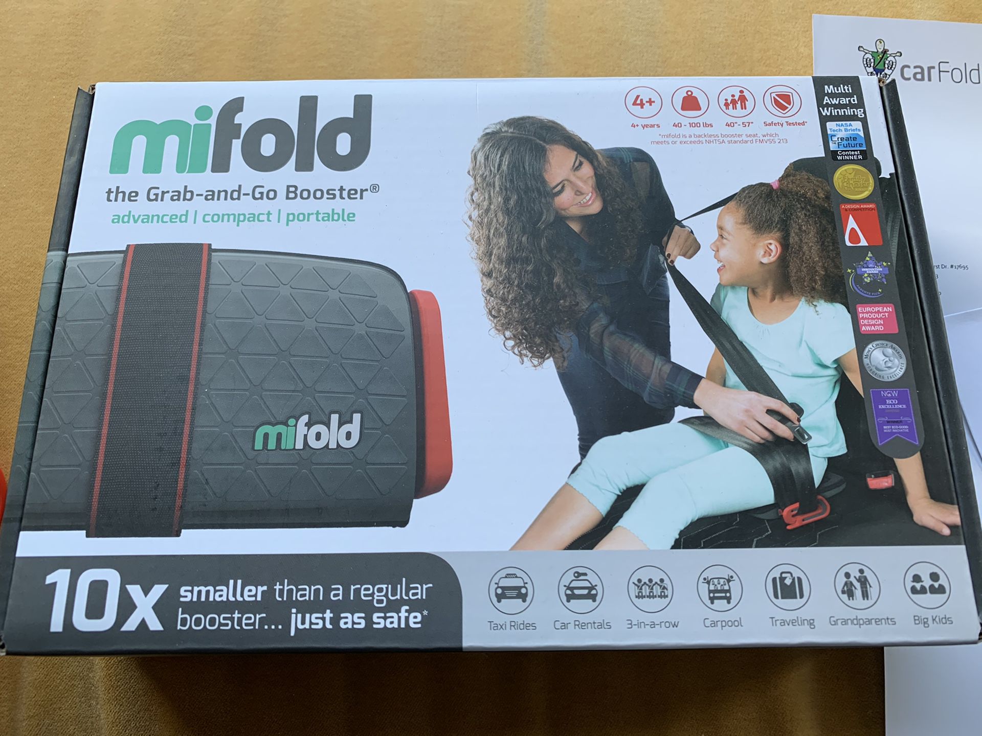 Mifold Grab and Go Car Booster Seat - Portable NEW