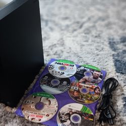 Xbox One X With 6 Games in Good Condition 