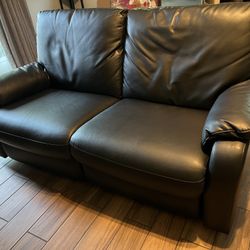 Power reclining sofa