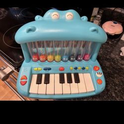 B. Toys Hippo Piano 