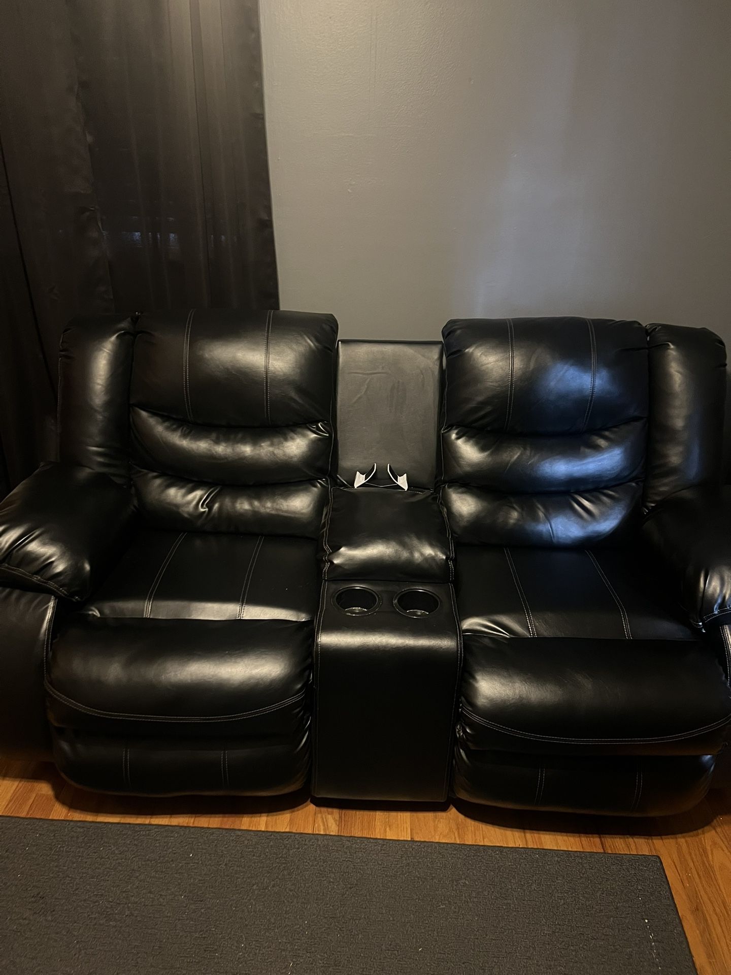 Black Leather Reclining Loveseat