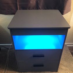 Nightstand with charger and hidden storage