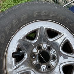 6 Lug 17” Stock Chevy Rims & Tire