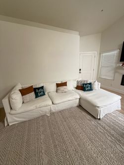 White Slipcovered Sectional Sofa with Chaise