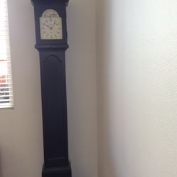 Tall thin grandfather clock