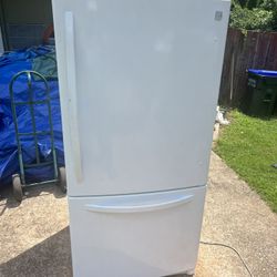 White Kenmore refrigerator and freezer