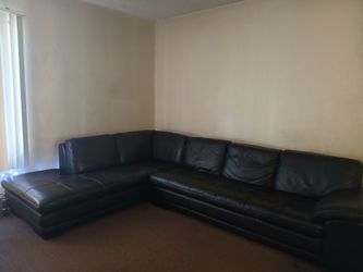 LEATHER COUCH AND 65" IN. VIZIO TV