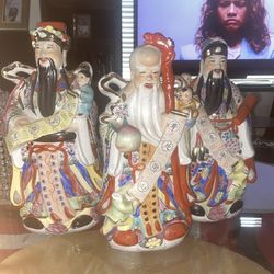 These figurines are known as Fu Lu Shou, representing the Three Star Gods
