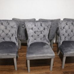Six Tufted Dining Chairs