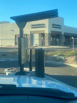 Stainless steel awning/shade structure for digital drive through menu