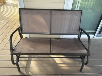 Outdoor rocking loveseat