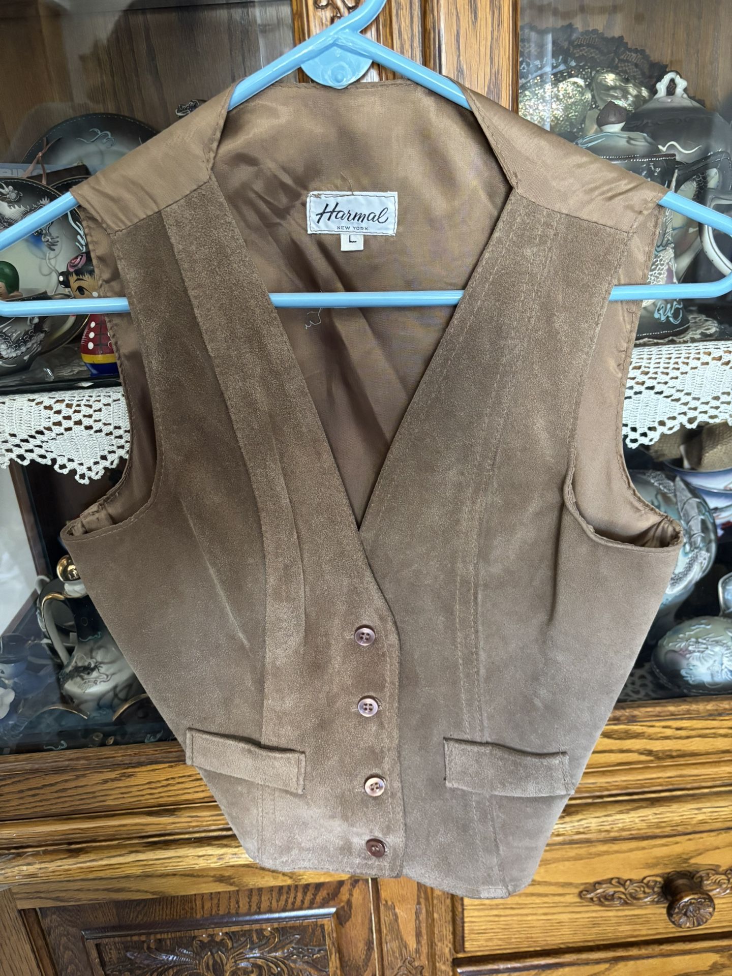vintage mid 1970's Harmal New York ladies light brown suede large vest with button up front. Lining is 100% acetate. Dry clean only