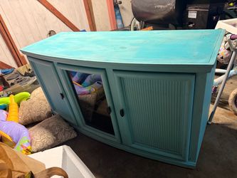 Teal entertainment center