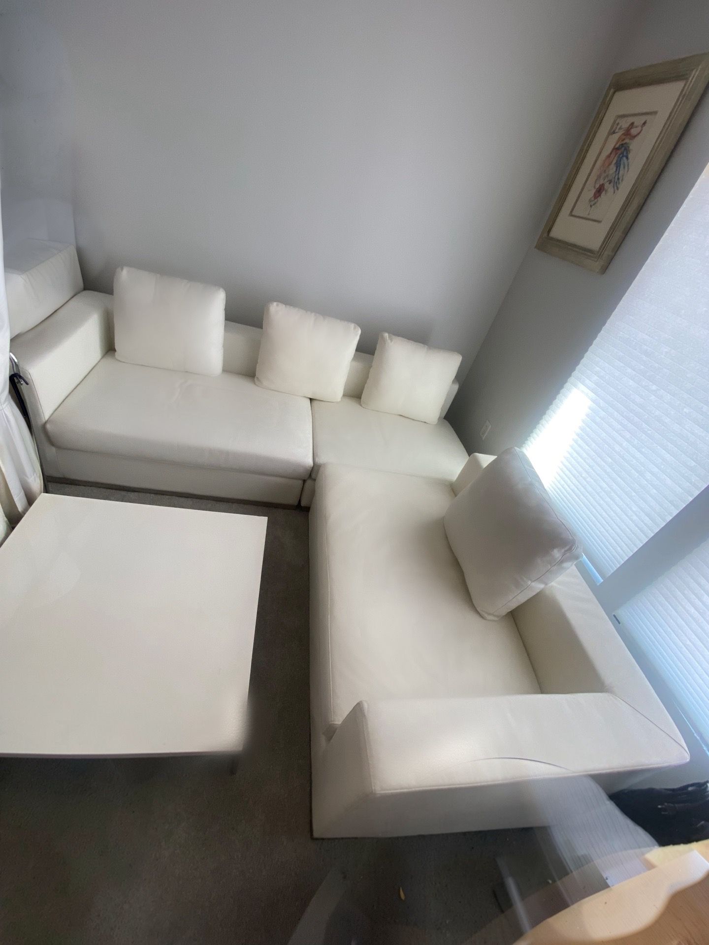 Modern white leather L shaped couch