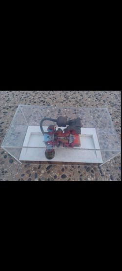 Turborcharger Cutaway In A Plastic Display Case