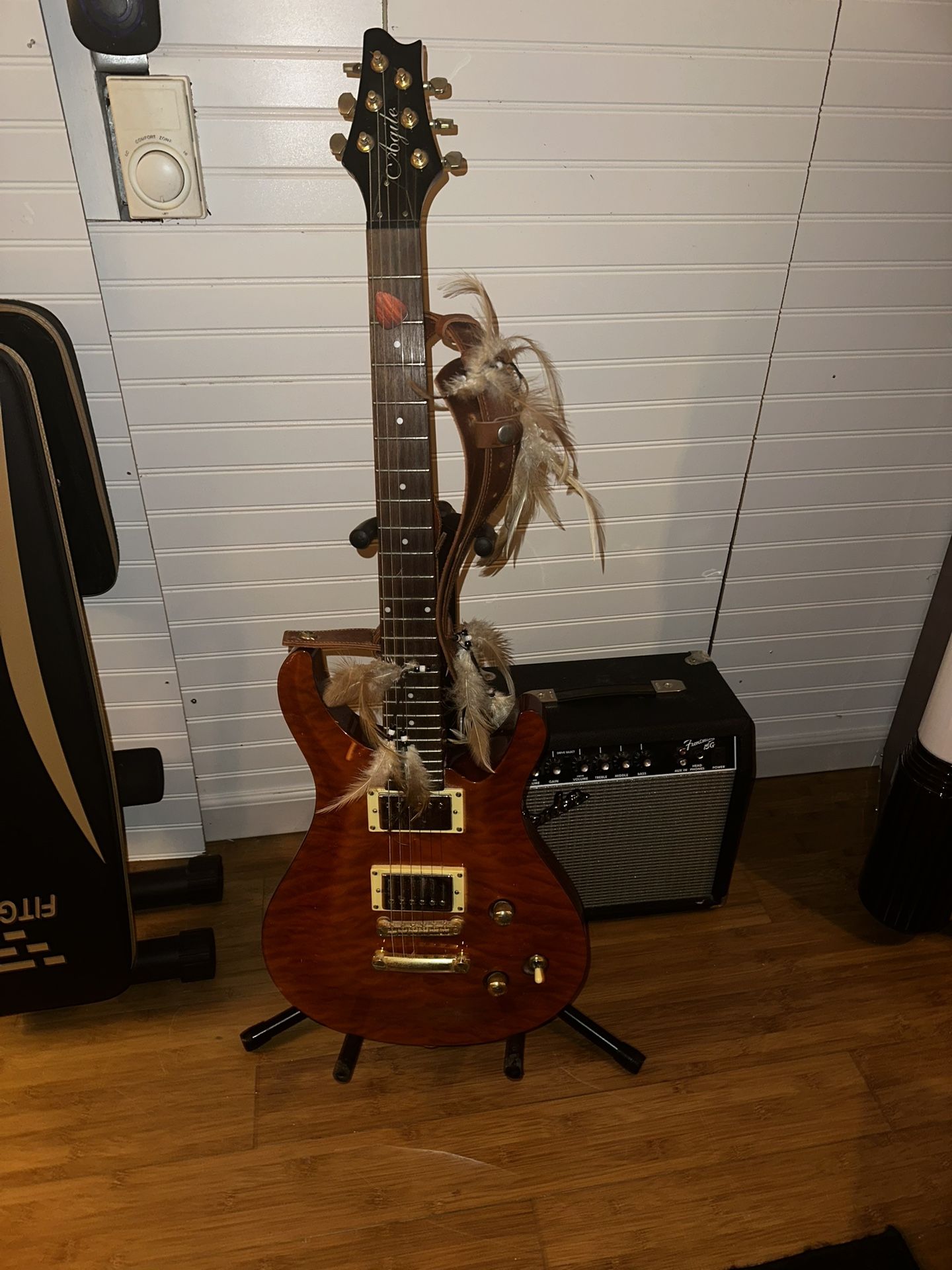 Agile Guitar With Fender speaker