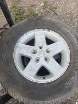 Two 17 inch jeep wheels