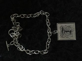 " T " initial pendant with heavy thick chain necklace.