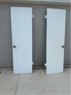 Two wooden doors in good condition. $50 each or $80 for both