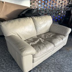 2 X Leather Loveseat $75each