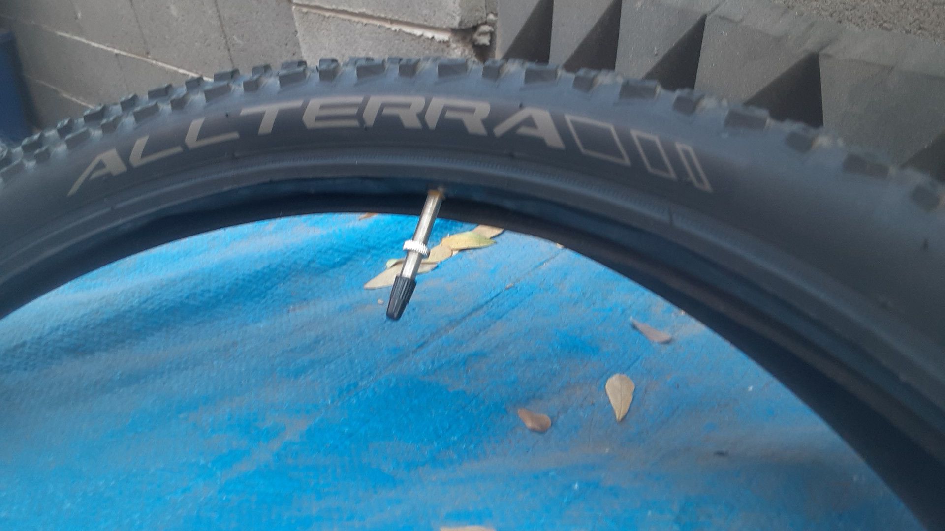 Allterra 27.5x2.10 54-584 (650B) Innova mountain bike tires and 1 specialized tube