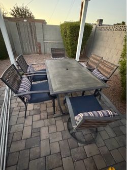 7-Piece Outdoor Patio Dining Set – 2 Swivel Rocker Chairs – $400