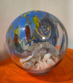 Hand Blown Art Glass Sea Globe With Sand & Seashells Teal, Yellow & Blue 8" New, perfect for decorating a room with a marine atmosphere.