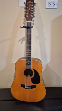 Mitchell 12 string acoustic guitar