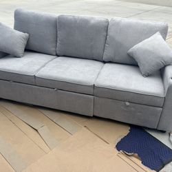 New Grey Couch W Pullout Bed.  82.5x33x33H.  Free Delivery!