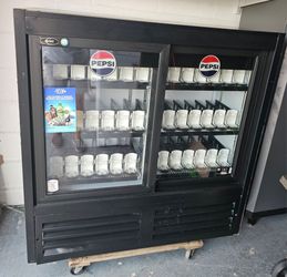 BEVERAGE CENTER. ...CONMERCIAL REFRIGERATOR ...48 INCHES WIDE......$ 900