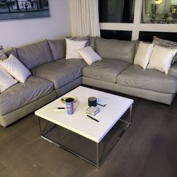 Grey Leather Sectional And Coffee Table 